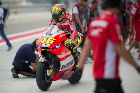 ALCANIZ, ARAGON - SEPTEMBER 17:   Valentino Rossi of Italy and Ducati Marlboro Team starts from box during  the qualifying practice of the MotoGP of Spain at Motorland Aragon Circuit on September 17, 2011 in Alcaniz, Spain.  (Photo by Mirco Lazzari gp/Getty Images)