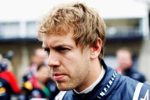 MONTREAL, CANADA - JUNE 12:  Sebastian Vettel of Germany and Red Bull Racing prepares to drive during the Canadian Formula One Grand Prix at the Circuit Gilles Villeneuve on June 12, 2011 in Montreal, Canada.  (Photo by Mark Thompson/Getty Images)