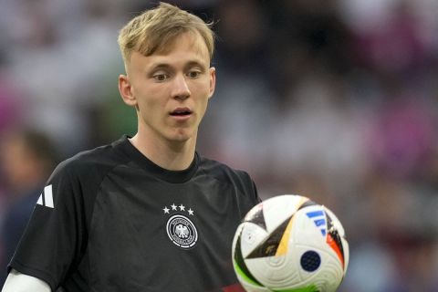 Germany's Maximilian Beier controls the ball during warm up before a Group A match between Germany and Scotland at the Euro 2024 soccer tournament in Munich, Germany, Friday, June 14, 2024. (AP Photo/Antonio Calanni)