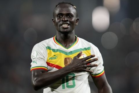 Senegal's Sadio Mane celebrate after scoring his side's third goal during the African Cup of Nations Group C soccer match between Senegal and Cameroon, at the Charles Konan Banny stadium in Yamoussoukro, Ivory Coast, Friday, Jan. 19, 2024. (AP Photo/Sunday Alamba)