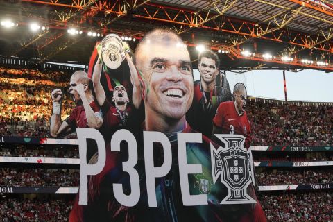 A banner to former Portugal international, Pepe, is unfurled before the UEFA Nations League soccer match between Portugal and Croatia at the Luz stadium in Lisbon, Thursday, Sept. 5, 2024. (AP Photo/Armando Franca)