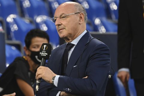 Giuseppe Marotta, CEO for sport at Inter speaks during an interview before the Europa League round of 16 soccer match between Inter Milan and Getafe at the Veltins-Arena in Gelsenkirchen, Germany, Wednesday, Aug. 5, 2020. (Ina Fassbender, Pool Photo via AP)