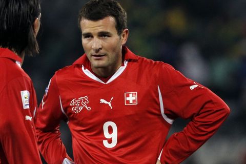 Switzerland's Alex Frei, right, looks on during the World Cup group H soccer match between Switzerland and Honduras at Free State Stadium in Bloemfontein, South Africa, Friday, June 25, 2010.  (AP Photo/Bernat Armangue)