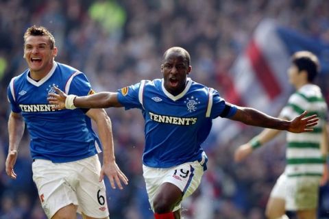 GLASGOW, SCOTLAND - MARCH 25:  Sone Aluko of Rangers celebrates scoring a goal during the Clydesdale Bank Scottish Premier League match between Rangers and Celtic at Ibrox Stadium on March 25, 2012 in Glasgow, Scotland.  (Photo by Ian Walton/Getty Images)