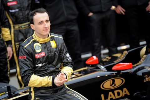 Lotus Renault's Polish driver Robert Kubica poses during the presentation of the new Lotus Renault GP R31 at Ricardo Tormo racetrack on January 31, 2011 in Cheste, near Valencia, eastern Spain.       AFP PHOTO/ JOSE JORDAN (Photo credit should read JOSE JORDAN/AFP/Getty Images)