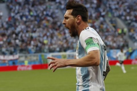 Argentina's Lionel Messi celebrates after scoring the opening goal of his team during the group D match between Argentina and Nigeria, at the 2018 soccer World Cup in the St. Petersburg Stadium in St. Petersburg, Russia, Tuesday, June 26, 2018. (AP Photo/Petr David Josek)