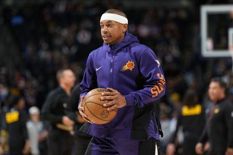 Phoenix Suns guard Isaiah Thomas in the first half of an NBA basketball game Wednesday, March 27, 2024, in Denver. (AP Photo/David Zalubowski)