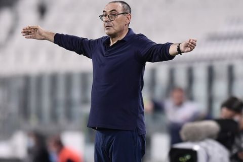 Juventus' head coach Maurizio Sarri gestures during the Serie A soccer match between Juventus and Lecce, at the Allianz Stadium in Turin, Italy, Friday, June 26, 2020. (Fabio Ferrari/LaPresse via AP)