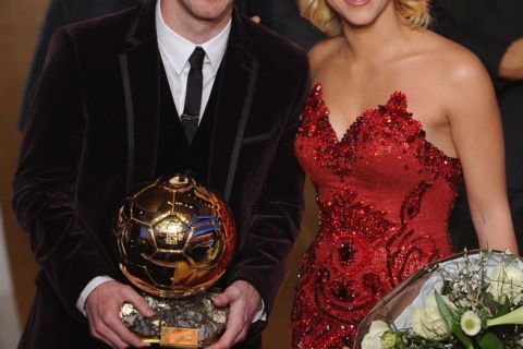 Barcelona's Argentinian forward Lionel Messi poses with Colombian singer Shakira (R) after receiving for the third time the FIFA Ballon d'Or award on January 9, 2012 at the Kongresshaus during the FIFA Ballon d'Or ceremony in Zurich.       AFP PHOTO / FRANCK FIFE (Photo credit should read FRANCK FIFE/AFP/Getty Images)