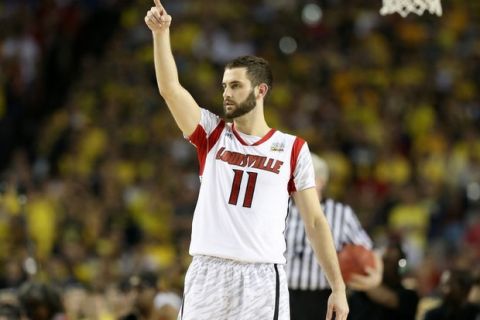 ATLANTA, GA - APRIL 08:  Luke Hancock #11 of the Louisville Cardinals reacts in the secon dhalf against the Michigan Wolverines during the 2013 NCAA Men's Final Four Championship at the Georgia Dome on April 8, 2013 in Atlanta, Georgia.  (Photo by Streeter Lecka/Getty Images)