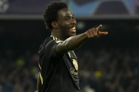 Union's David Datro Fofana celebrates after scoring his side's first goal during the Champions League, Group C, soccer match between Napoli and Union Berlin at the Diego Maradona stadium, in Naples, Italy, Wednesday, Nov. 8, 2023. (AP Photo/Gregorio Borgia)