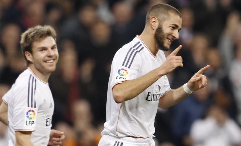 Partido de ida de los 1/8 de la Copa del Rey disputado entre el Real Real Madrid y el Osasuna. En la imagen, celebración de Benzema tras marcar el primer gol del Real Madrid. 

First leg of the 1/8 of the Spanish King Cup played between Real Real Madrid and Osasuna. In this picture, Benzema celebrates after scoring the first goal for Real Madrid.