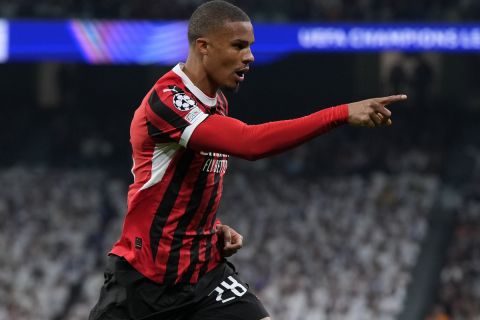 AC Milan's Malick Thiaw celebrates after scoring the opening goal against Real Madrid during the Champions League opening phase soccer match at the Santiago Bernabeu stadium in Madrid, Spain, Tuesday, Nov. 5, 2024. (AP Photo/Manu Fernandez)