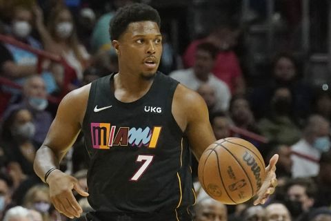 Miami Heat guard Kyle Lowry (7) dribbles the ball during the first half of an NBA basketball game against the Boston Celtics, Thursday, Nov. 4, 2021, in Miami. (AP Photo/Marta Lavandier)