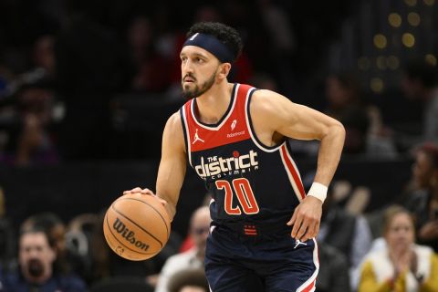 Washington Wizards guard Landry Shamet (20) in action during the first half of an NBA basketball game against the Cleveland Cavaliers, Wednesday, Feb 7, 2024, in Washington. (AP Photo/Nick Wass)