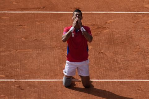 Serbia's Novak Djokovic blows a kiss after defeating Spain's Carlos Alcaraz in the men's singles tennis final at the Roland Garros stadium during the 2024 Summer Olympics, Sunday, Aug. 4, 2024, in Paris, France. (AP Photo/Andy Wong)