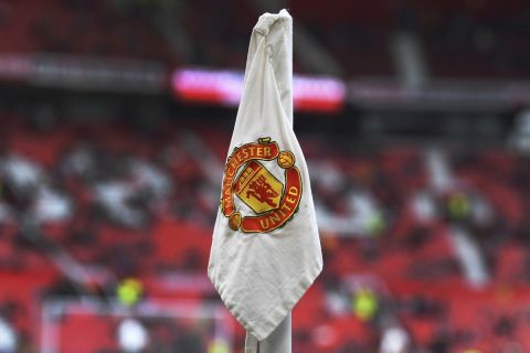 View of Manchester United badge on the corner flag during the English Premier League soccer match between Manchester United and Burnley at Old Trafford in Manchester, England, Saturday, April 27, 2024. (AP Photo/Rui Vieira)