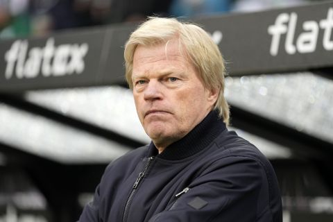 CEO of Bayern Munich Oliver Kahn looks on during the warm up before the German Bundesliga soccer match between Borussia Moenchengladbach and Bayern Munich at the Borussia Park in Moenchengladbach, Germany, Saturday, Feb. 18, 2023. (AP Photo/Martin Meissner)