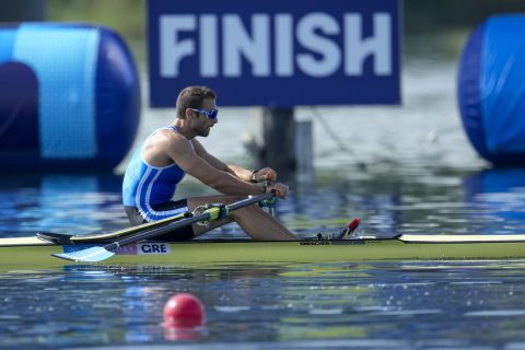 Stefanos Ntouskos, of Greece, competes in the men's single sculls rowing quarterfinal at the 2024 Summer Olympics, Tuesday, July 30, 2024, in Vaires-sur-Marne, France. (AP Photo/Ebrahim Noroozi)