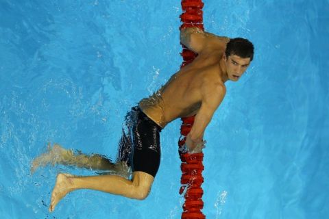 SHANGHAI, CHINA - JULY 26:  Michael Phelps of the United States swims towards the wall after he swam in the Men's 200m Butterfly Semi Final during Day Eleven of the 14th FINA World Championships at the Oriental Sports Center on July 26, 2011 in Shanghai, China.  (Photo by Quinn Rooney/Getty Images)