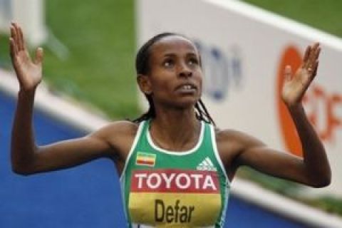 Ethiopia's Meseret Defar reacts after winning a Women's 5000m heat during the World Athletics Championships in Berlin on Wednesday, Aug. 19, 2009.  (AP Photo/Michael Probst)
