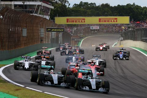 SAO PAULO, BRAZIL - NOVEMBER 15:  Nico Rosberg of Germany and Mercedes GP and Lewis Hamilton of Great Britain and Mercedes GP race into the first corner followed by the rest of the field during the Formula One Grand Prix of Brazil at Autodromo Jose Carlos Pace on November 15, 2015 in Sao Paulo, Brazil.  (Photo by Mark Thompson/Getty Images)