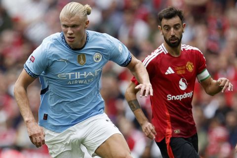 Manchester City forward Erling Haaland controls the ball during the FA Community Shield soccer match between Manchester City and Manchester United at Wembley Stadium in London, Saturday, Aug. 10, 2024. (AP Photo/David Cliff)