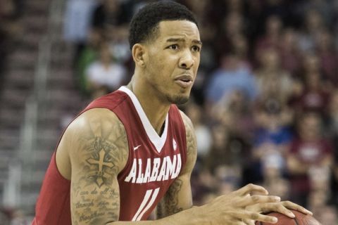 Alabama forward Shannon Hale (11) dribbles the ball during the first half of an NCAA college basketball game against South Carolina Tuesday, Feb. 7, 2017, in Columbia, S.C. Alabama defeated South Carolina 90-86. (AP Photo/Sean Rayford)


