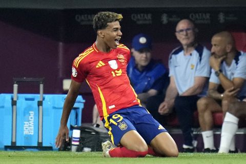 Spain's Lamine Yamal celebrates his side's equalising goal during a semifinal match between Spain and France at the Euro 2024 soccer tournament in Munich, Germany, Tuesday, July 9, 2024. (AP Photo/Hassan Ammar)