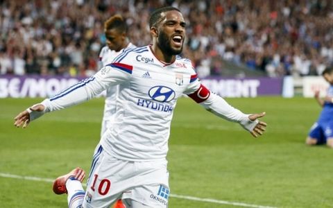 Olympique Lyon's Alexandre Lacazette celebrates after scoring against Bastia during their French Ligue 1 soccer match at the Gerland stadium in Lyon April 15, 2015.  REUTERS/Robert Pratta