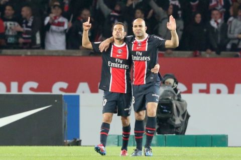 Paris Saint-Germain's Brazilian defender Alex Costa (R) celebrates after scoring a goal  during the French L1 football match Paris vs Marseille, on April 08, 2012 at the Parc des Princes stadium in Paris. AFP PHOTO KENZO TRIBOUILLARD (Photo credit should read KENZO TRIBOUILLARD/AFP/Getty Images)