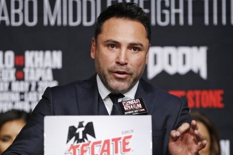 Oscar De La Hoya speaks at a news conference at the MGM Grand, Wednesday, May 4, 2016, in Las Vegas. (AP Photo/John Locher)