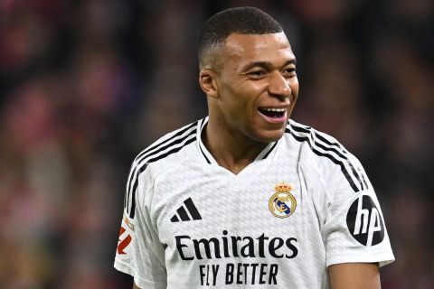 Real Madrid's Kylian Mbappe smiles during the Spanish La Liga soccer match between Athletic Bilbao and Real Madrid at the San Mames stadium in Bilbao, Spain, Wednesday, Dec. 4, 2024. (AP Photo/Miguel Oses)