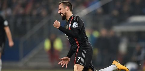 Bayern Munich's French midfielder Franck Ribery celebrates scoring the 0-3 goal during the German Cup DFB football match Hamburg SV vs FC Bayern Munich in Hamburg, northern Germany on October 29, 2014. AFP PHOTO / ODD ANDERSEN

RESTRICTIONS / EMBARGO  ACCORDING TO DFB RULES IMAGE SEQUENCES TO SIMULATE VIDEO IS NOT ALLOWED DURING MATCH TIME. MOBILE (MMS) USE IS NOT ALLOWED DURING AND FOR FURTHER TWO HOURS AFTER THE MATCH. FOR MORE INFORMATION CONTACT DFB DIRECTLY AT +49 69 67880        (Photo credit should read ODD ANDERSEN/AFP/Getty Images)