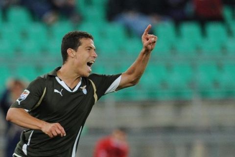 Lazio's Brazilian midfielder Anderson Hernanes celebrates after scoring during an Italian serie A football match Bari vs Lazio at San Nicola stadium in Bari on October 17, 2010. AFP PHOTO / ALBERTO PIZZOLI (Photo credit should read ALBERTO PIZZOLI/AFP/Getty Images)