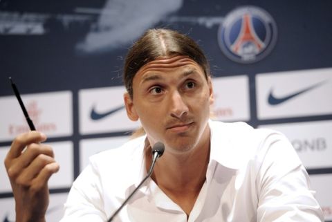 Paris Saint-Germain (PSG) football club's newly recruited Sweden striker Zlatan Ibrahimovic speaks during a press conference as part of his official presentation at the Parc des Princes on July 18, 2012 in Paris.  AFP PHOTO / BERTRAND GUAY        (Photo credit should read BERTRAND GUAY/AFP/GettyImages)