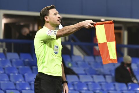 Everton's James Rodriguez gestures as he speaks to the assistant referee following a disalowed goal for offside during the English Premier League soccer match between Everton and Leeds United, at Goodison Park in Liverpool, England, Saturday Nov. 28, 2020. (Peter Powell/Pool Via AP)