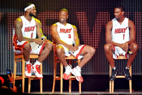 MIAMI - JULY 09:   LeBron James #6, Dwyane Wade #3 and Chris Bosh #1 of the Miami Heat speak after being introduced to fans during a welcome party at American Airlines Arena on July 9, 2010 in Miami, Florida.  (Photo by Doug Benc/Getty Images)