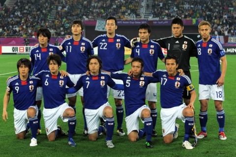 Japan's players (top L-R) midfielder Jungo Fujimoto, forward Ryoichi Maeda, defender Maya Yoshida, defender Yasuyuki Konno, goalkeeper Eiji Kawashima, midfielder Keisuke Honda, (bottom L-R) forward Shinji Okazaki, defender Atsuto Uchida, midfielder Yasuhito Endo, defender Yuto Nagatomo and midfielder Makoto Hasebe pose for a group picture before the start of their 2011 Asian Cup final football match against Australia in the Qatari capital Doha on January 29, 2011. AFP PHOTO/MANAN VATSYAYANA (Photo credit should read MANAN VATSYAYANA/AFP/Getty Images)