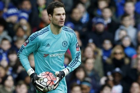 Chelsea goalkeeper Asmir Begovic goes to take a kick during the English FA Cup third round soccer match between Chelsea and Scunthorpe United at Stamford Bridge stadium in London, Sunday, Jan. 10, 2016 . (AP Photo/Alastair Grant)