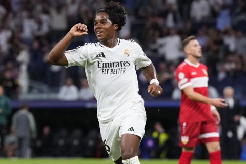 Real Madrid's Endrick celebrates after scoring his side's third goal during the Champions League opening phase soccer match between Real Madrid and VfB Stuttgart at the Santiago Bernabeu stadium, in Madrid, Tuesday, Sept. 17, 2024. Real Madrid won 3-1. (AP Photo/Manu Fernandez)