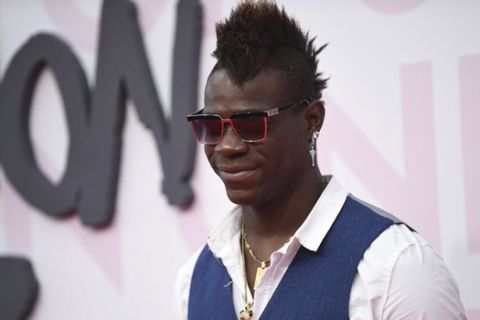 Soccer Player Mario Balotelli poses for photographers upon arrival at the Fashion For Relief 2018 event during the 71st international film festival, Cannes, southern France, Sunday, May 13, 2018. (Photo by Arthur Mola/Invision/AP)