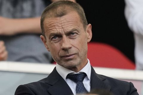 Hungary's Prime Minister Viktor Orban talks with UEFA President Aleksander Ceferin prior to the start of a Group A match between Germany and Hungary at the Euro 2024 soccer tournament in Stuttgart, Germany, Wednesday, June 19, 2024. (AP Photo/Antonio Calanni)