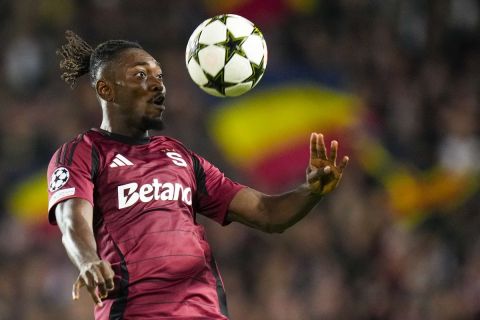 Sparta's Victor Olatunji controls the ball during the Champions League play-off second leg soccer match between Sparta Praha and Malmo at the Letna stadium in Prague, Czech Republic, Tuesday, Aug. 27, 2024. (AP Photo/Petr David Josek)