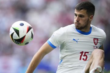 Czech Republic's David Jurasek controls the ball during a Group F match between Georgia and the Czech Republic at the Euro 2024 soccer tournament in Hamburg, Germany, Saturday, June 22, 2024. (AP Photo/Ebrahim Noroozi)