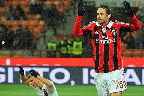 Colombian defender of Milan, Mario Yepes, jubilates after scoring the goal during the Italy Cup soccer match AC Milan vs Reggina Calcio at Giusppe Meazza stadium in Milan, Italy, 13 december 2012.
ANSA/DANIEL DAL ZENNARO