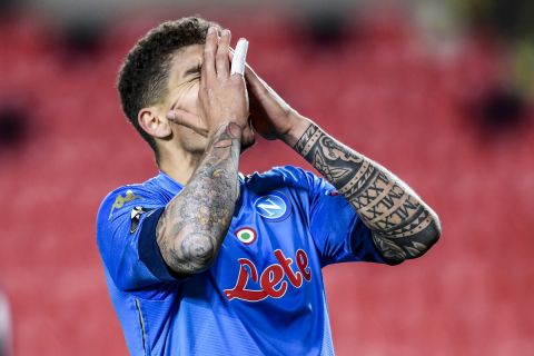 Napoli's Giovanni Di Lorenzo reacts during the Europa League, round of 32, first leg soccer match between Granada and Napoli at the Los Carmenes stadium in Granada, Spain, Thursday, Feb. 18, 2021. (AP Photo/Jose Breton)