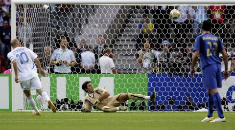 BERLIN - JULY 09:  Zinedine Zidane #10 (L) of France scores the opening goal from the penalty spot, past Goalkeeper Gianluigi Buffon (C) of Italy during the FIFA World Cup Germany 2006 Final match between Italy and France at the Olympic Stadium on July 9, 2006 in Berlin, Germany.
  (Photo by Ben Radford/Getty Images)