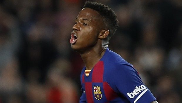 Barcelona's Ansu Fati celebrates after scoring his side's opening goal during a Spanish La Liga soccer match between Barcelona and Levante at the Camp Nou stadium in Barcelona, Spain, Sunday Feb. 2, 2020. (AP Photo/Joan Monfort)