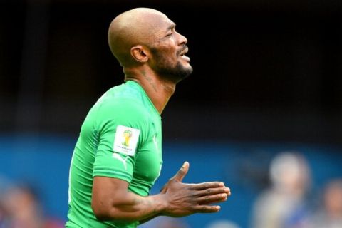 BRASILIA, BRAZIL - JUNE 19: Didier Zokora of the Ivory Coast reacts after receiving an yellow card during the 2014 FIFA World Cup Brazil Group C match between Colombia and Cote D'Ivoire at Estadio Nacional on June 19, 2014 in Brasilia, Brazil.  (Photo by Stuart Franklin - FIFA/FIFA via Getty Images)